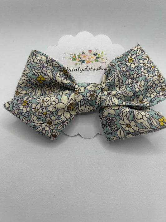 Blue rose and hubble pinwheel fabric bow