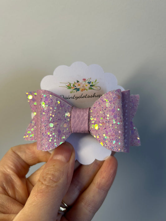Glitzy Pink Delights, double glitter and pink leatherette bow sold singular.