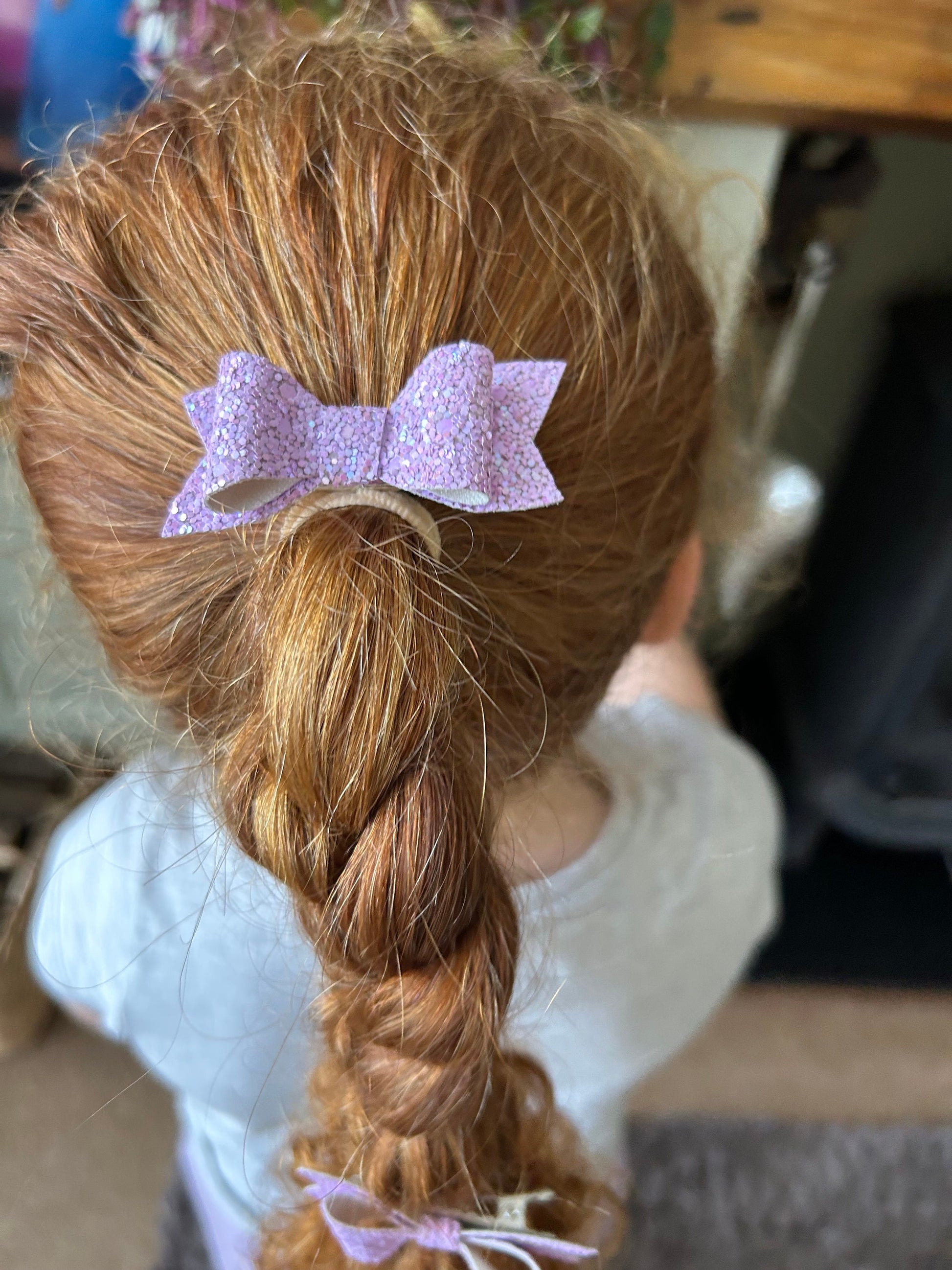 A pair of lilac frost glitter bows ideal as a gift or stocking filler.