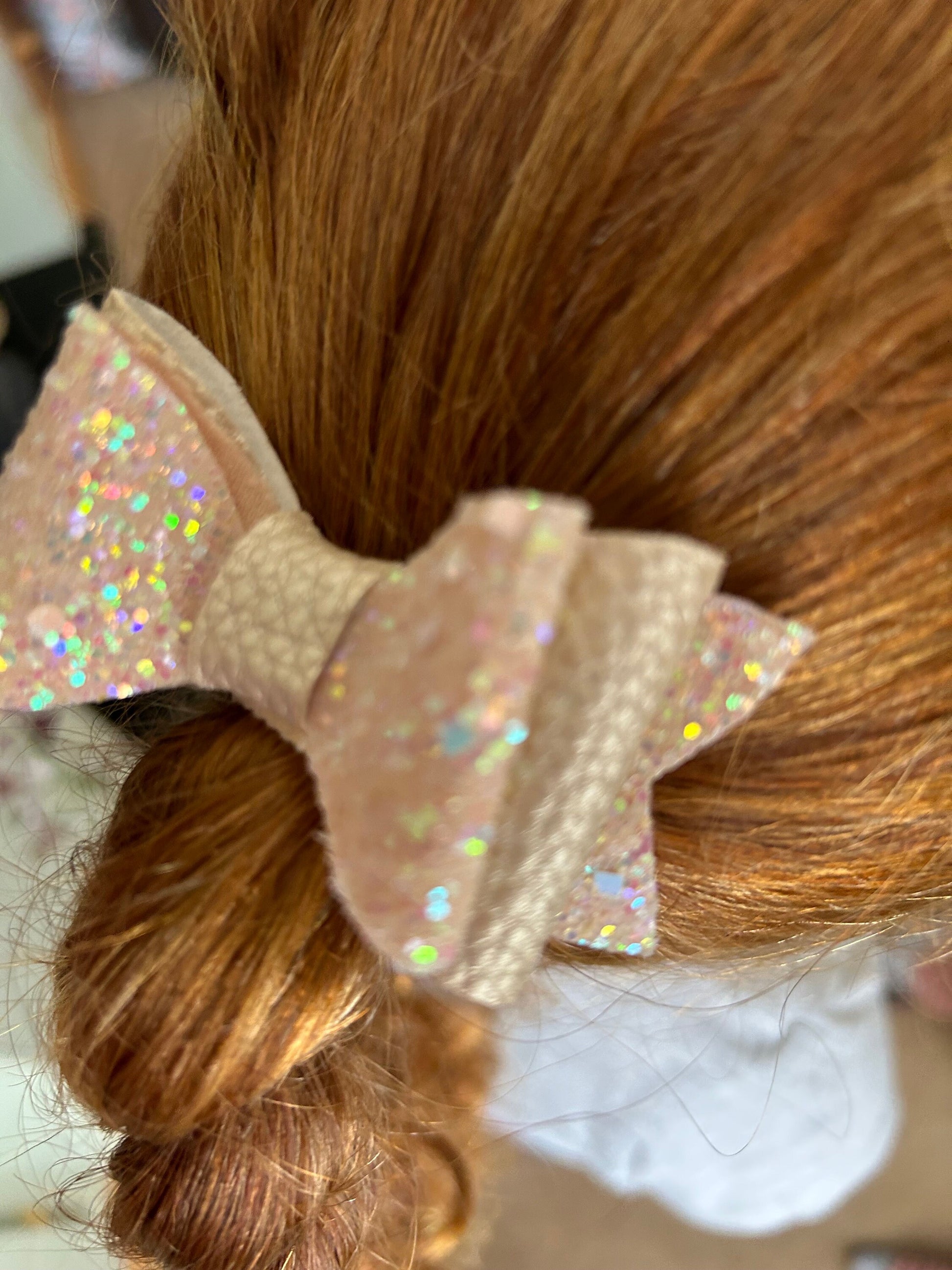 Champagne chunky double glitter with nude leatherette bow sold singular. Christmas Eve box/stocking filler