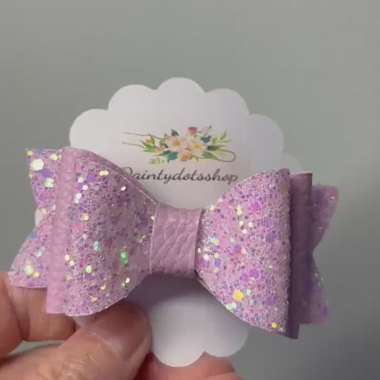 Glitzy Pink Delights, double glitter and pink leatherette bow sold singular.